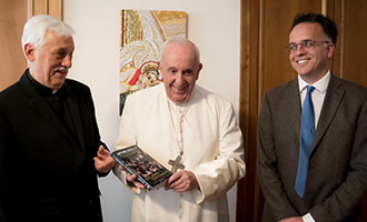 Pope Francis receives first copy of Fr General Arturo Sosa’s new book, “Walking with Ignatius”